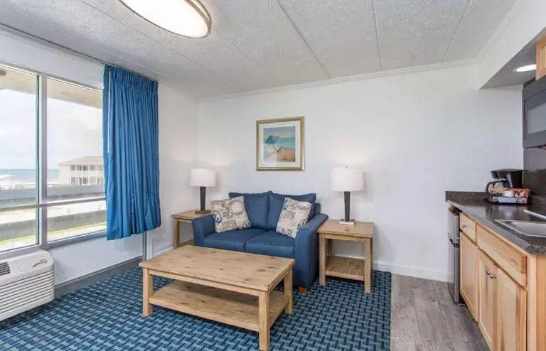 Two double beds in a kitchen suite at Mariner Inn and Suites